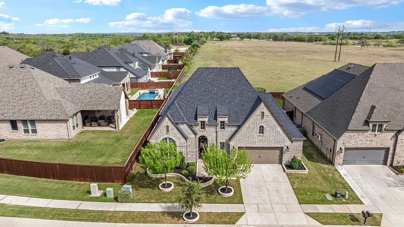Completed roof replacement on Grant Avenue in Lantana, TX 76226 — RoofDog residential roofing project with premium architectural shingles