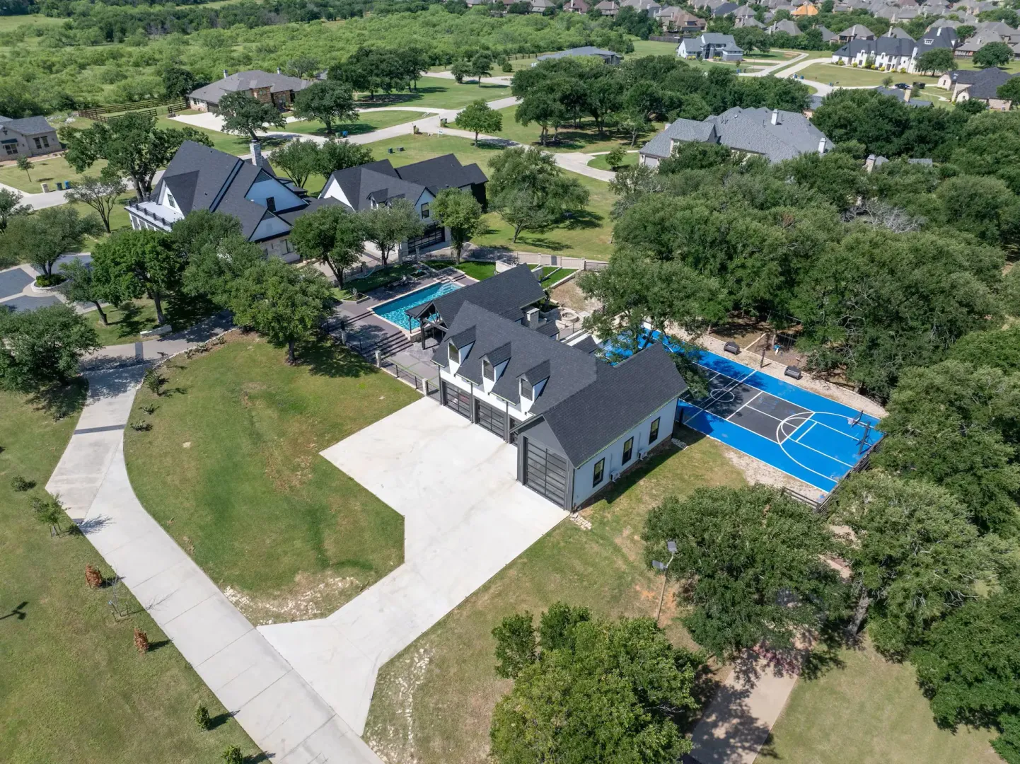 Owens Corning Onyx Black shingle roof installation on Quiet Hill Circle in Lantana, TX 76226 — RoofDog residential roofing project